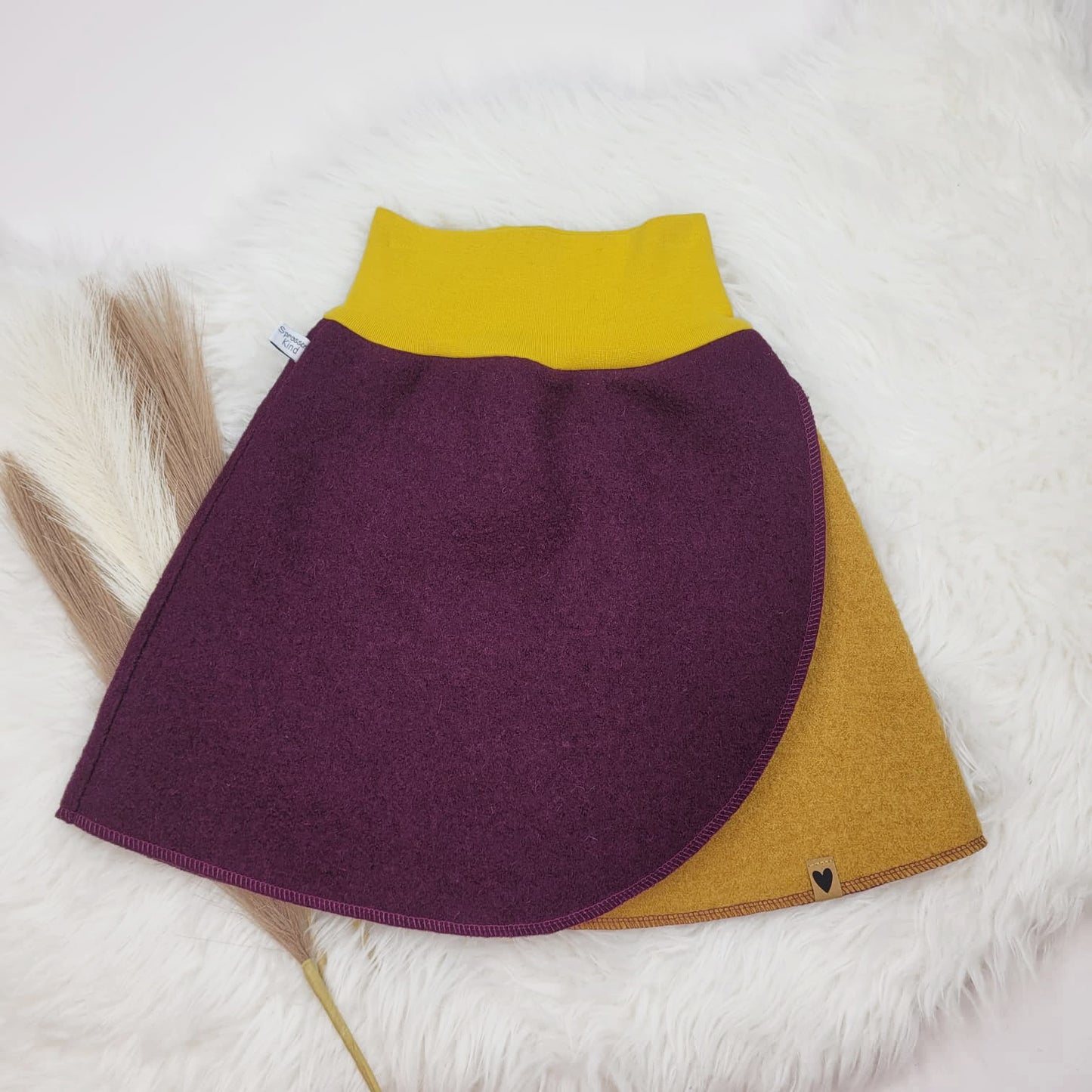 Walkrock lila/senf Gr. 122/128